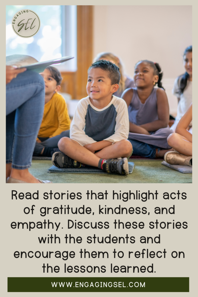 Students are sitting on the carpet listening to the teacher read a story about gratitude. The text says" read stories that highlight acts of gratitude, kindness and empathy. Discuss these stories with students and encourage them to reflect on the lessons learned." 